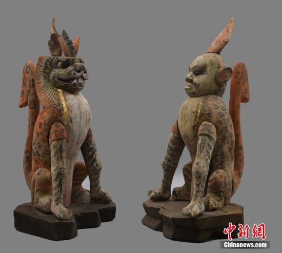 圖為慕容智墓出土鎮(zhèn)墓獸。 中新社發(fā) 甘肅省文物局 供圖