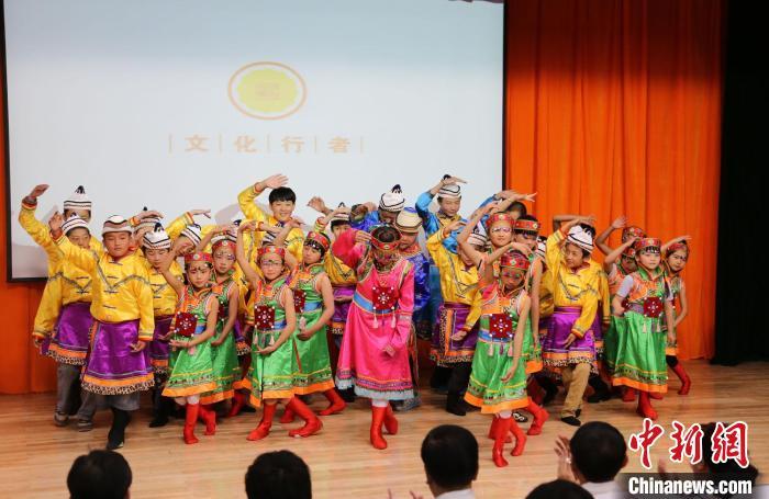 圖為蘭州大學(xué)文化行者團(tuán)隊(duì)走進(jìn)民族社區(qū)，開展系列活動(dòng)。(資料圖)蘭州大學(xué)供圖